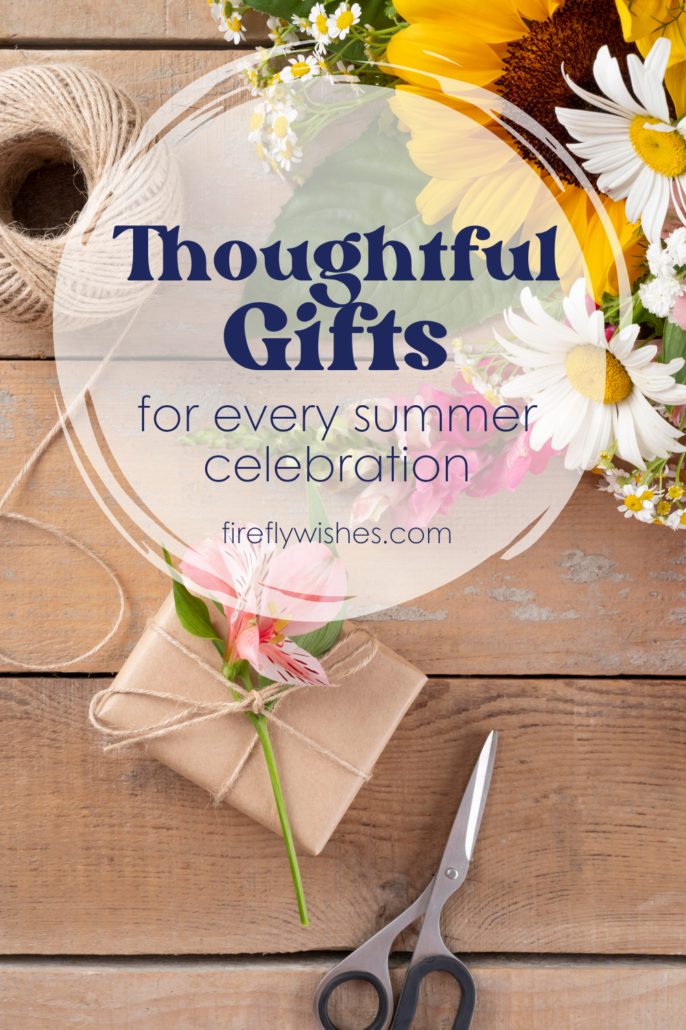 Kraft-wrapped gift box with pink flowers and twine, styled on a rustic wood surface with wildflowers—symbolizing heartfelt, handmade gifting.