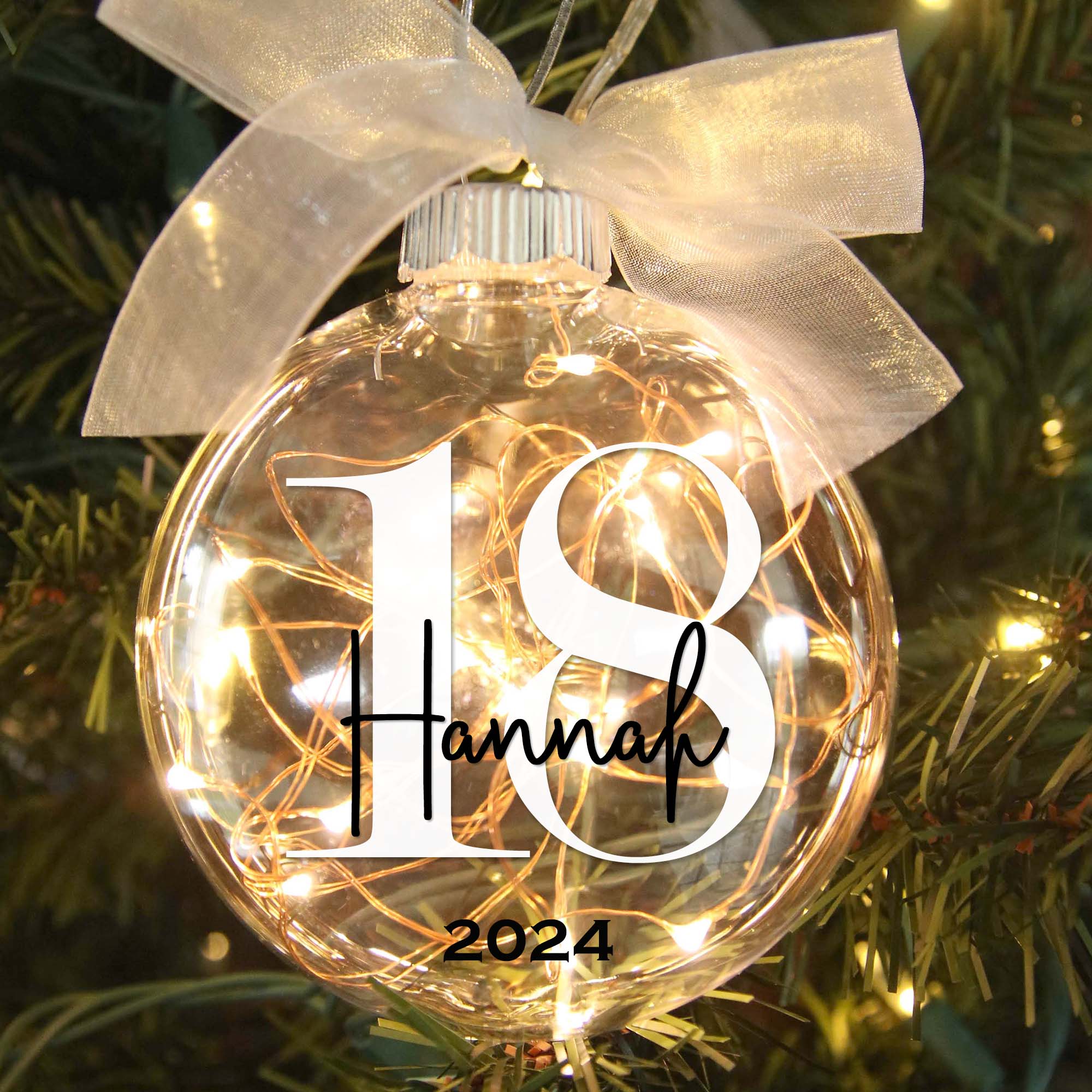 Personalized 18th birthday light-up ornament in tree