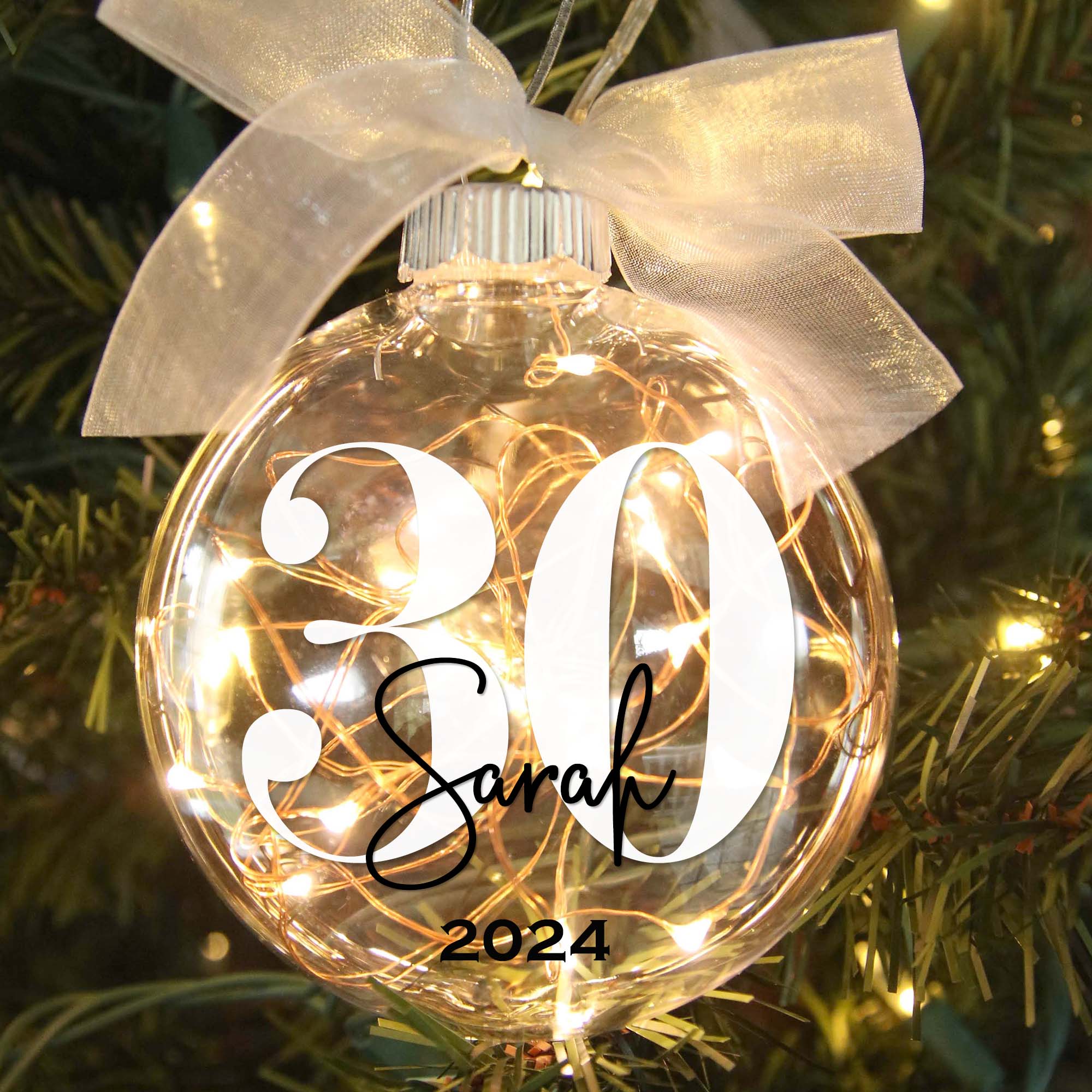 Personalized 30th lighted christmas ornament in tree