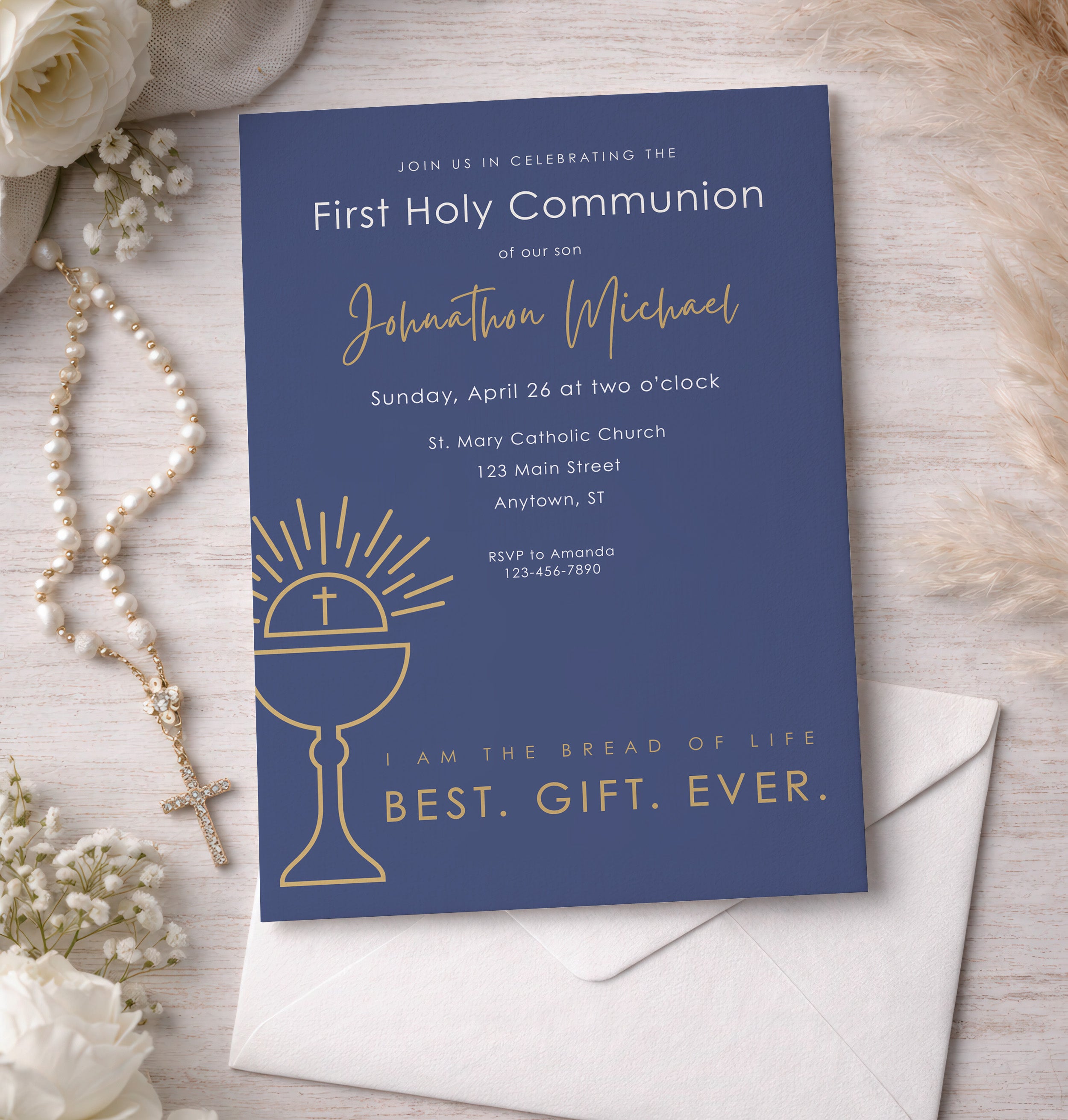 First Holy Communion invitation card with chalice design on a wooden surface with flowers and a rosary.